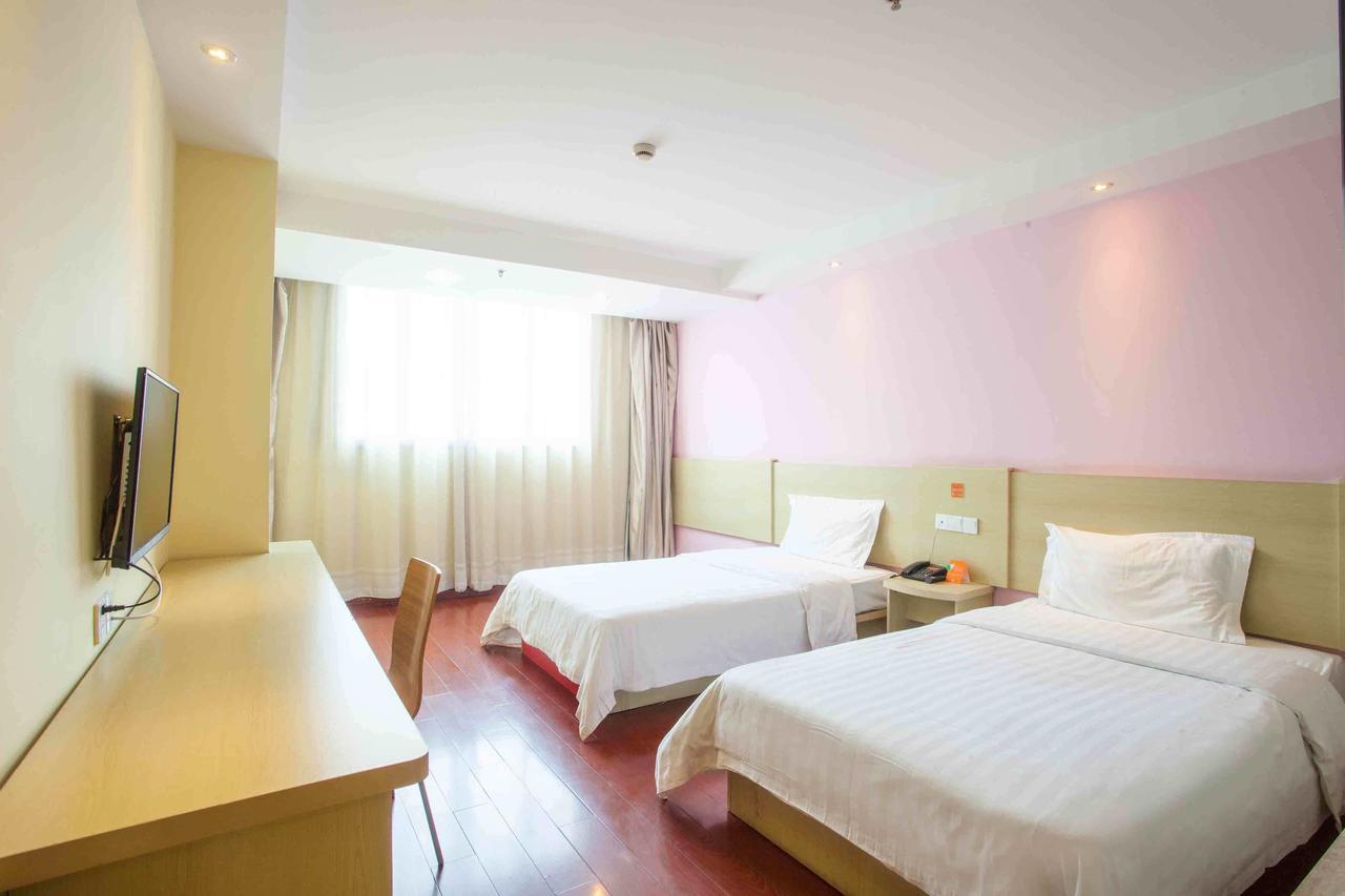 7 Days Inn Yangjiang Xinyue International Studio חדר תמונה